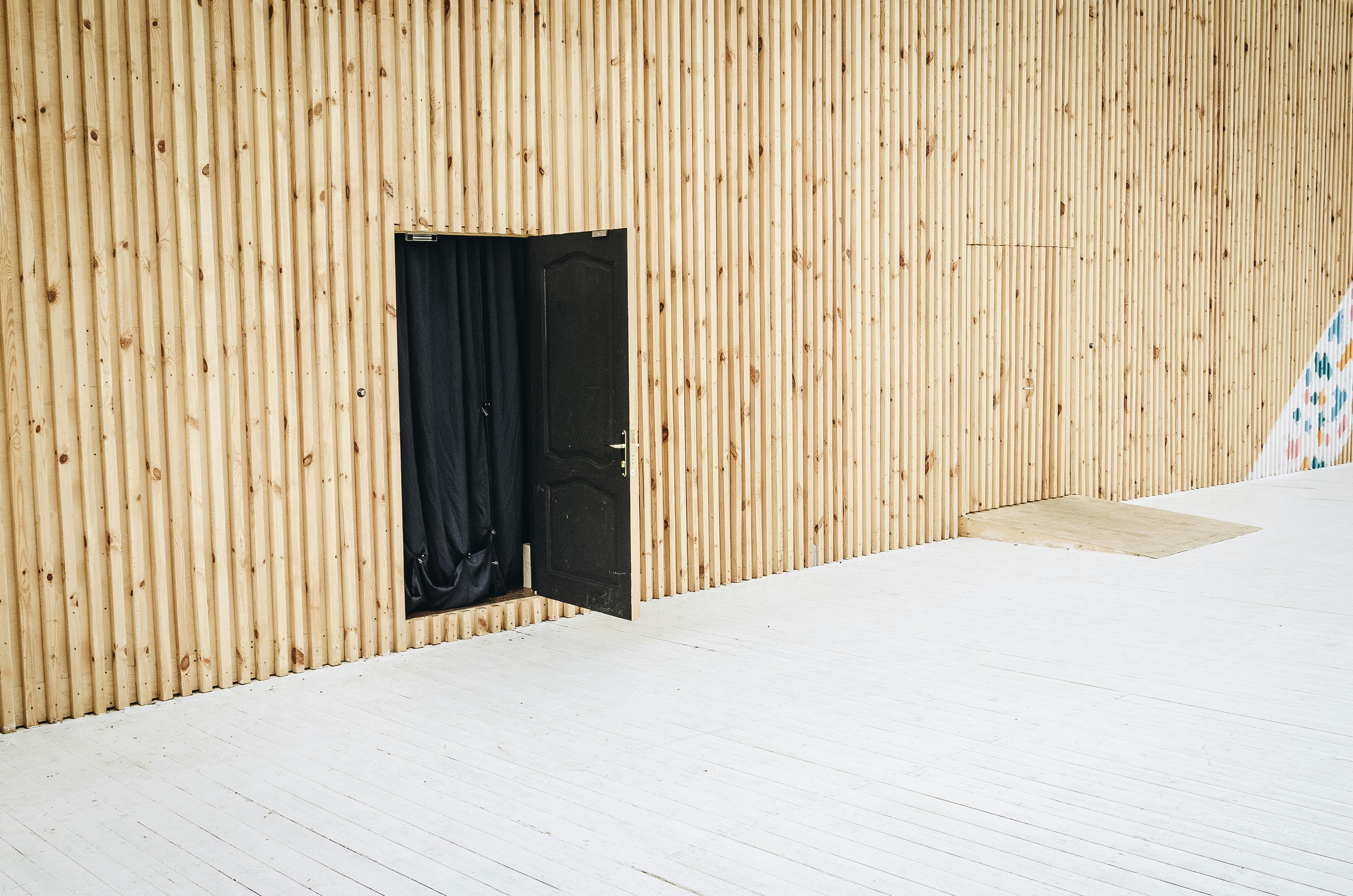 Open Black Door Photo - Photo by <a href="https://unsplash.com/@betagamma?utm_content=creditCopyText&utm_medium=referral&utm_source=unsplash">Daniil Silantev</a> on <a href="https://unsplash.com/photos/open-black-door-2C_rzX52vcg?utm_content=creditCopyText&utm_medium=referral&utm_source=unsplash">Unsplash</a>