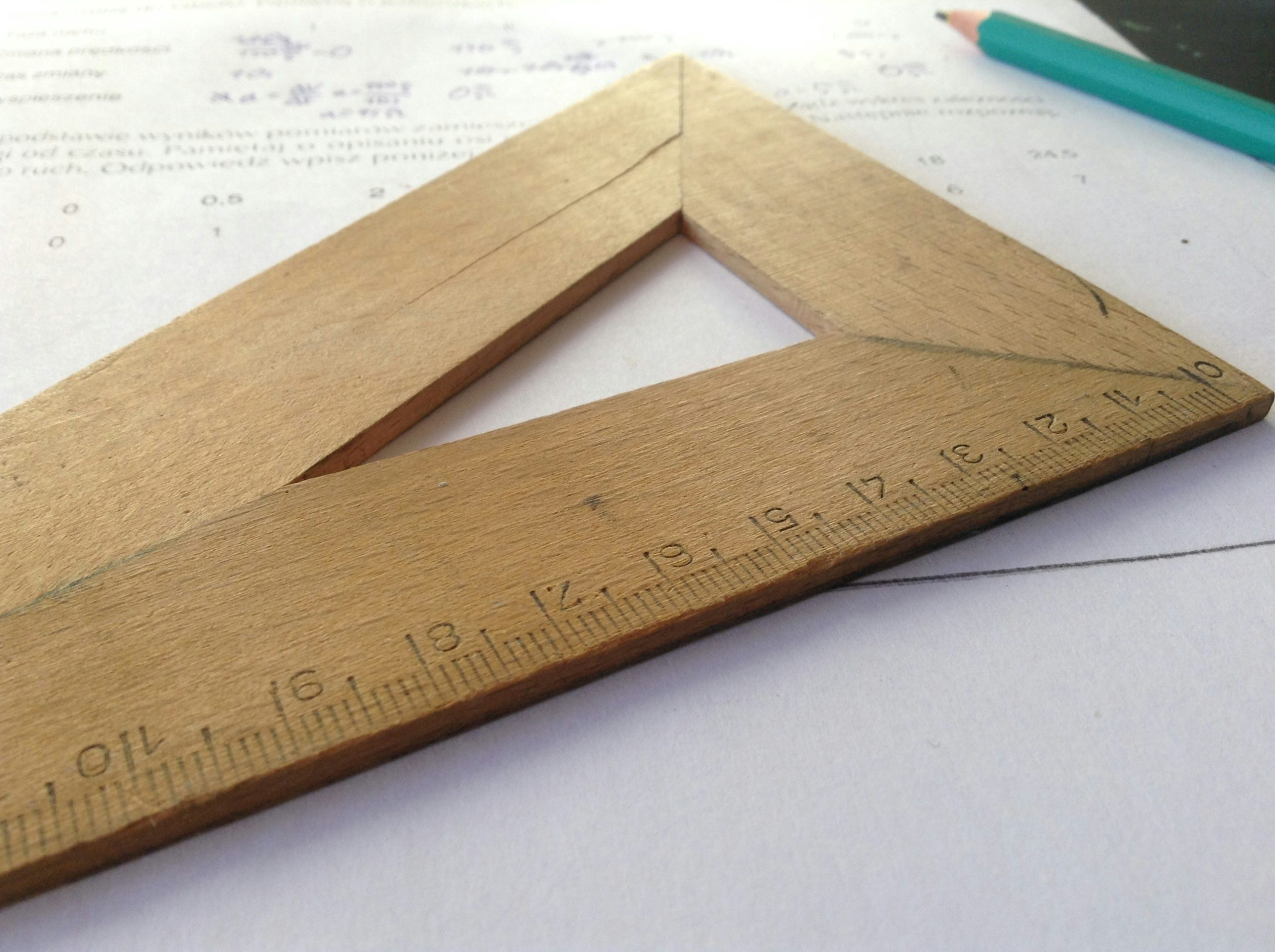 Brown Wooden Triangle Ruler - Photo by Dawid Małecki on Unsplash